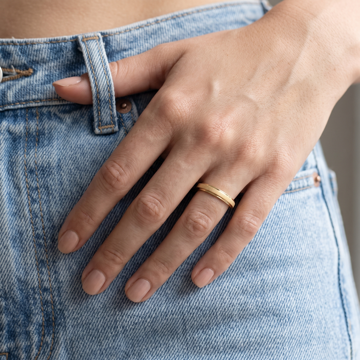 Frosted Ring in gold, worn with denim