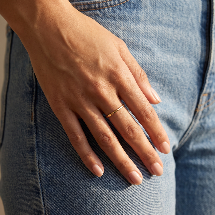 Hammered Ring in gold, worn on the hand