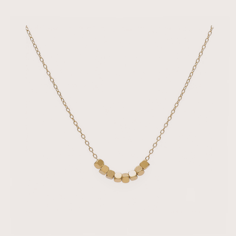 Block Necklace in gold: eight small square blocks on a fine chain