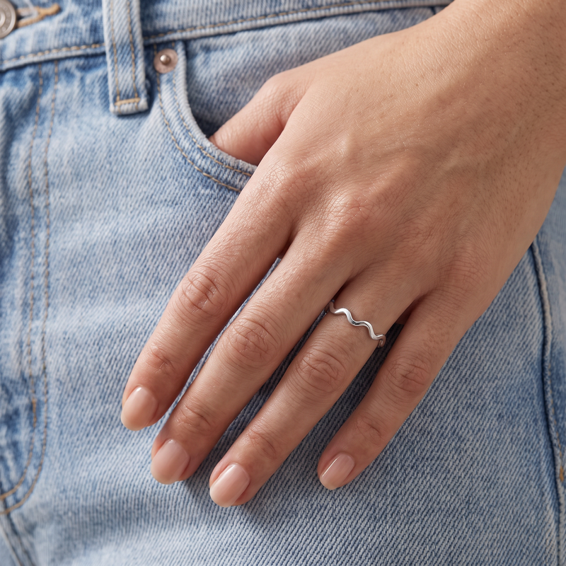 Wave Ring in silver, worn on the hand