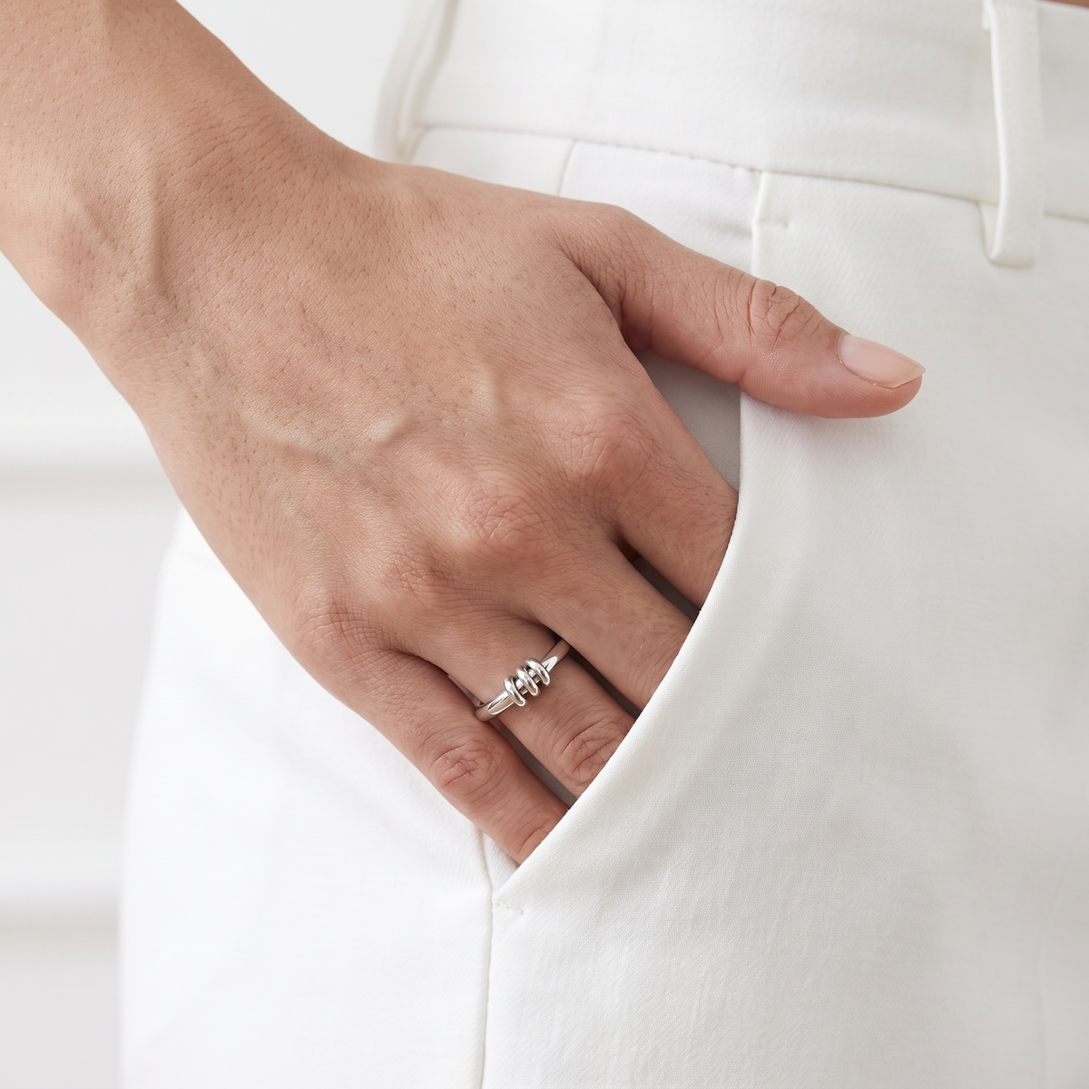 Arc Ring in silver, worn on the hand