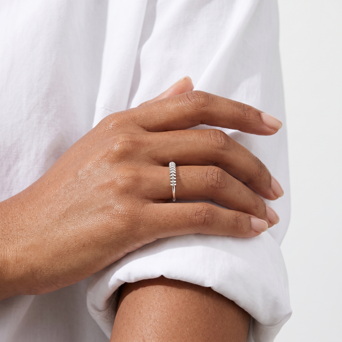 Orbit Ring in silver, worn on the hand