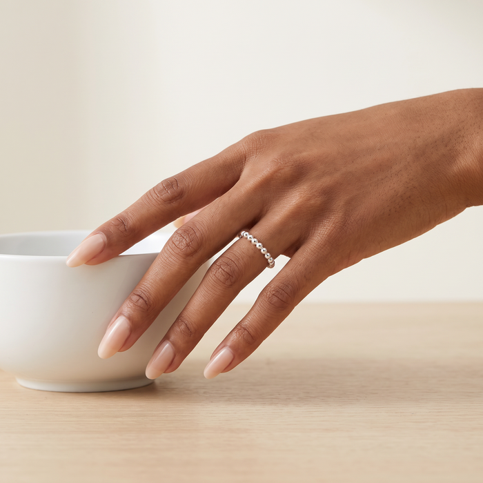 Bead Ring in silver, worn on the hand